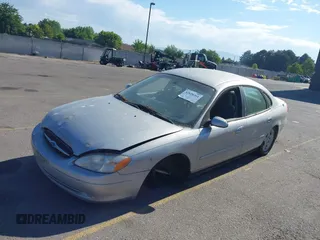 2000 Ford Taurus SES with VIN 1FAFP55U1YA246677, listed as a IAAI auction lot 42626261 with 228,669 mi miles and . Bid and sale history available at DreamBid. Image 2.