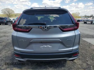 2020 Honda CR-V Touring z VIN 2HKRW2H95LH650860, wystawiony jako Copart lot #55510015 z przebiegiem 68 680 mil mil oraz Szkoda całkowita • Salvage title. Historia ofert i sprzedaży dostępna na DreamBid. Obrazek 6.