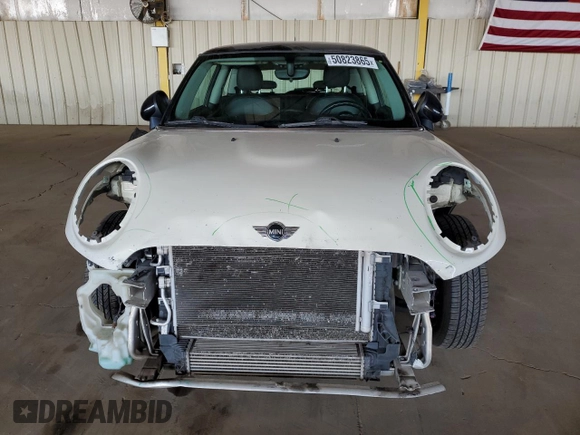 2014 MINI Hardtop with VIN WMWXM5C50ET933486, listed as a Copart auction lot 50823865 with 98,296 mi miles and Salvage Title. Bid and sale history available at DreamBid. Image 5.