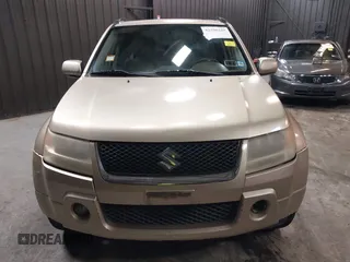 2007 Suzuki Grand Vitara Luxury z VIN JS3TD947474201594, wystawiony jako IAAI lot #42296225 z przebiegiem 120 309 mil mil oraz . Historia ofert i sprzedaży dostępna na DreamBid. Obrazek 12.