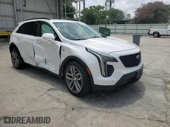 2020 Cadillac XT4 FWD Sport with VIN 1GYFZER49LF123830, listed as a Copart auction lot 55737985 with 98,871 mi miles and Salvage title. Bid and sale history available at DreamBid. Image 14.