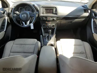 2014 Mazda CX-5 Touring with VIN JM3KE4CY4E0407868, listed as a Copart auction lot 52564315 with 137,989 mi miles and Salvage Title. Bid and sale history available at carsss.com. Image 8.