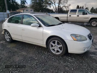 2002 Nissan Altima SE with VIN 1N4BL11E72C201420, listed as a Copart auction lot 41718455 with 192,323 mi miles and Salvage Title. Bid and sale history available at carsss.com. Image 4.