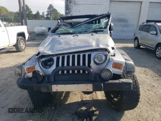 2003 Jeep Wrangler Rubicon z VIN 1J4FA69S53P375189, wystawiony jako Copart lot #54292035 z przebiegiem 55 863 mil mil oraz Szkoda całkowita • Salvage title. Historia ofert i sprzedaży dostępna na DreamBid. Obrazek 5.