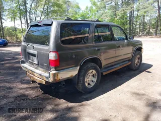 1998 Toyota 4Runner SR5 with VIN JT3HN86R5W0186057, listed as a IAAI auction lot 42117603 with 286,316 mi miles and . Bid and sale history available at DreamBid. Image 4.