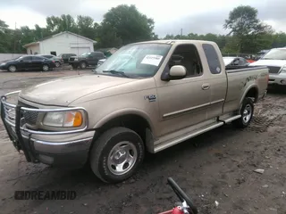 2000 Ford F-150 XL with VIN 1FTRX18L2YNA47066, listed as a IAAI auction lot 42127285 with 1 mi miles. Bid and sale history available at carsss.com. Image 2.