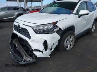 2019 Toyota RAV4 XLE with VIN 2T3W1RFV5KW051023, listed as a IAAI auction lot 40970612 with 106,359 mi miles and . Bid and sale history available at DreamBid. Image 6.