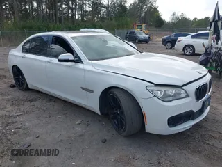 2015 BMW 7 Series 750Li with VIN WBAYE8C54FD780951, listed as a IAAI auction lot 41813038 with 103,131 mi miles. Bid and sale history available at carsss.com. Image 1.