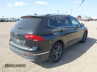 2024 Volkswagen Tiguan SE with VIN 3VVNB7AXXRM031028, listed as a IAAI auction lot 41832841 with 16,170 mi miles and . Bid and sale history available at DreamBid. Image 4.