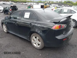 2014 Mitsubishi Lancer SE with VIN JA32V2FW5EU005615, listed as a IAAI auction lot 42204917 with 141,285 mi miles and . Bid and sale history available at carsss.com. Image 3.
