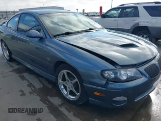 2006 Pontiac GTO with VIN 6G2VX12UX6L561098, listed as a IAAI auction lot 41487635 with 69,741 mi miles. Bid and sale history available at carsss.com. Image 1.