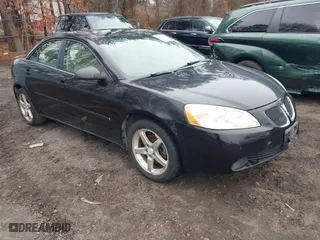 2006 Pontiac G6 6-Cyl with VIN 1G2ZG558164261058, listed as a IAAI auction lot 41834798 with 106,012 mi miles. Bid and sale history available at carsss.com. Image 1.