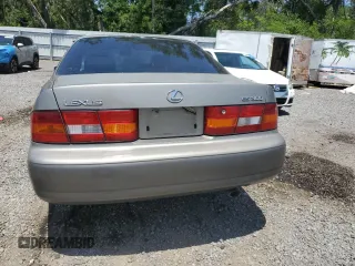 1999 Lexus ES 300 z VIN JT8BF28G6X0220031, wystawiony jako Copart lot #57346835 z przebiegiem Nie podano mil oraz Szkoda całkowita • Salvage title. Historia ofert i sprzedaży dostępna na DreamBid. Obrazek 6.