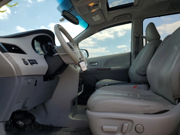 2012 Toyota Sienna XLE AAS with VIN 5TDYK3DCXCS199580, listed as a Copart auction lot 52455405 with 113,259 mi miles and Salvage Title. Bid and sale history available at DreamBid. Image 7.