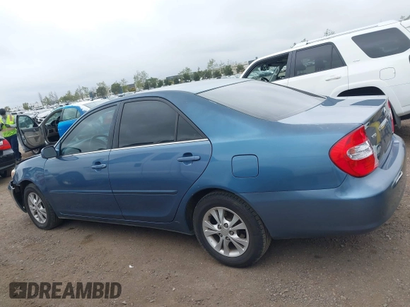 2004 Toyota Camry LE with VIN 4T1BF32K54U572537, listed as a IAAI auction lot 41850322 with 167,076 mi miles and . Bid and sale history available at DreamBid. Image 14.