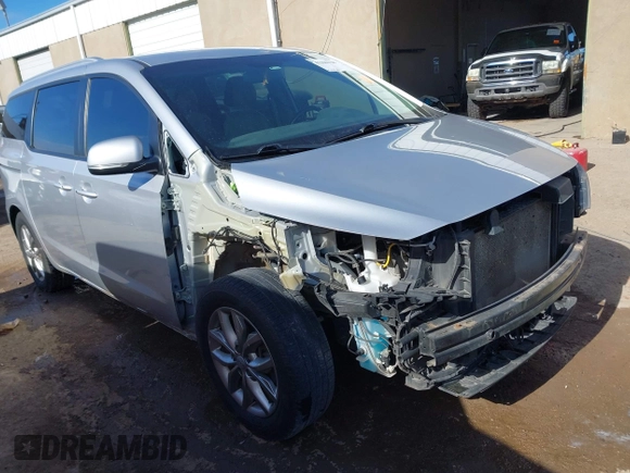2021 Kia Sedona EX with VIN KNDMB5C11M6664811, listed as a IAAI auction lot 41390328 with 128,568 mi miles. Bid and sale history available at carsss.com. Image 1.