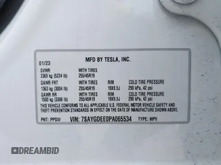 2023 Tesla Model Y Long Range z VIN 7SAYGDEE0PA065534, wystawiony jako IAAI lot #42445868 z przebiegiem 22 638 mil mil oraz . Historia ofert i sprzedaży dostępna na DreamBid. Obrazek 9.