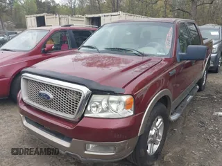 2004 Ford F-150 XLT with VIN 1FTPW12564KD77115, listed as a IAAI auction lot 41929386 with 213,172 mi miles. Bid and sale history available at carsss.com. Image 2.