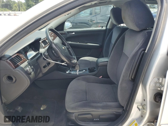 2014 Chevrolet Impala LT with VIN 2G1WB5E39E1130562, listed as a Copart auction lot 64448415 with 62,409 mi miles and Salvage title. Bid and sale history available at DreamBid. Image 7.