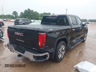 2024 GMC Sierra 1500 SLT with VIN 3GTUUDED6RG275549, listed as a IAAI auction lot 42481593 with 6,174 mi miles and . Bid and sale history available at DreamBid. Image 4.