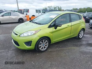 2013 Ford Fiesta SE with VIN 3FADP4EJ7DM136723, listed as a IAAI auction lot 42090284 with 168,004 mi miles and . Bid and sale history available at DreamBid. Image 2.