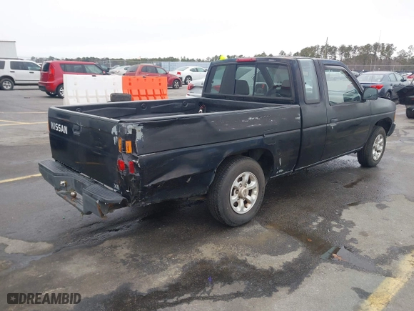 1996 Nissan Trucks 2WD XE with VIN 1N6SD16S5TC385180, listed as a IAAI auction lot 41345326 with 262,211 mi miles. Bid and sale history available at carsss.com. Image 4.
