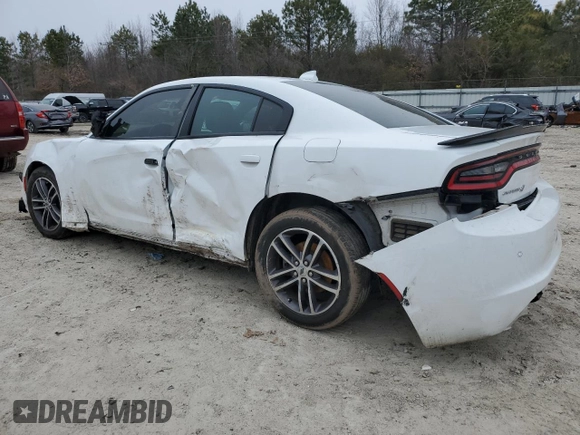 2019 Dodge Charger SXT with VIN 2C3CDXJG9KH756208, listed as a Copart auction lot 45816895 with 102,777 mi miles and Salvage Title. Bid and sale history available at DreamBid. Image 2.