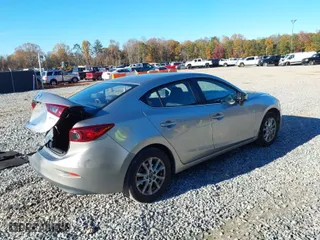 2016 Mazda Mazda3 i Sport with VIN JM1BM1U71G1315193, listed as a IAAI auction lot 41093477 with 214,069 mi miles. Bid and sale history available at carsss.com. Image 4.