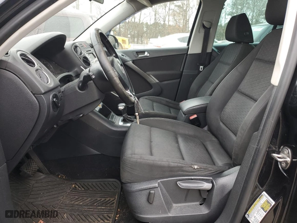 2009 Volkswagen Tiguan S with VIN WVGAV75N49W525409, listed as a Copart auction lot 88822545 with 154,228 mi miles and Salvage Title. Bid and sale history available at carsss.com. Image 7.