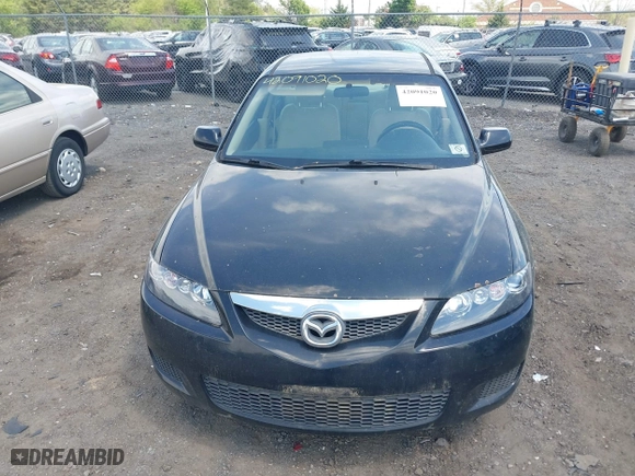 2006 Mazda Mazda6 Grand Touring s with VIN 1YVHP80DX65M52771, listed as a IAAI auction lot 42091020 with 207,727 mi miles. Bid and sale history available at carsss.com. Image 6.
