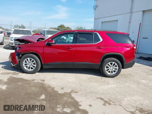 2021 Chevrolet Traverse LT Cloth with VIN 1GNEVGKW1MJ100973, listed as a IAAI auction lot 41477074 with 56,167 mi miles. Bid and sale history available at carsss.com. Image 14.