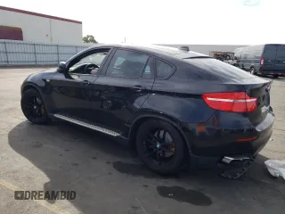 2011 BMW X6 50i with VIN 5UXFG8C52BLZ95196, listed as a Copart auction lot 79100194 with 0 mi miles and Salvage Title. Bid and sale history available at carsss.com. Image 2.