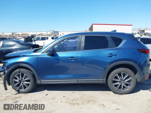 2018 Mazda CX-5 Touring with VIN JM3KFBCM0J0302916, listed as a IAAI auction lot 41837733 with 100,765 mi miles. Bid and sale history available at carsss.com. Image 15.