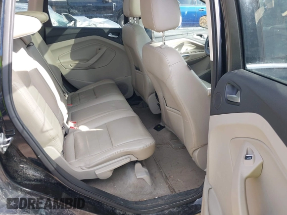 2016 Ford Escape Titanium with VIN 1FMCU9JX4GUB38303, listed as a IAAI auction lot 41788421 with 138,511 mi miles and . Bid and sale history available at DreamBid. Image 8.