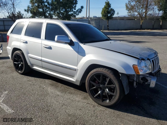 2007 Jeep Grand Cherokee SRT-8 with VIN 1J8HR78327C662597, listed as a Copart auction lot 85585864 with 184,430 mi miles and Salvage Title. Bid and sale history available at carsss.com. Image 4.