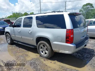 2012 Chevrolet Suburban LT z VIN 1GNSCJE01CR143982, wystawiony jako IAAI lot #42257552 z przebiegiem 202 973 mil mil oraz . Historia ofert i sprzedaży dostępna na DreamBid. Obrazek 3.