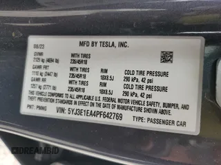 2023 Tesla Model 3 with VIN 5YJ3E1EA4PF642769, listed as a Copart auction lot 50648825 with 25,310 mi miles and Salvage title. Bid and sale history available at DreamBid. Image 14.