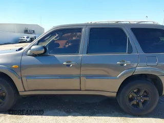 2005 Mazda Tribute S with VIN 4F2CZ06175KM49643, listed as a IAAI auction lot 41397843 with 185,088 mi miles and . Bid and sale history available at carsss.com. Image 14.