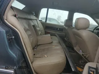 1996 Cadillac Fleetwood z VIN 1G6DW52P4TR704177, wystawiony jako Copart lot #49005355 z przebiegiem 145 635 mil mil oraz Czysty tytuł • Clean title. Historia ofert i sprzedaży dostępna na DreamBid. Obrazek 10.