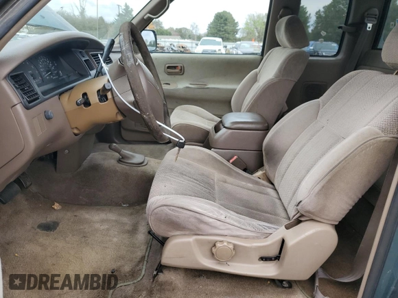1997 Toyota T100 SR5 with VIN JT4UN24DXV0048933, listed as a Copart auction lot 79479214 with 311,763 mi miles and Clean Title. Bid and sale history available at DreamBid. Image 7.