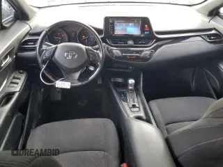 2018 Toyota C-HR XLE с VIN NMTKHMBX6JR016848, выставлен на аукционе Copart как лот 56939615 с пробегом 65 510 миль миль и Списание • Salvage title. История ставок и продаж доступна на DreamBid. Изображение 8.