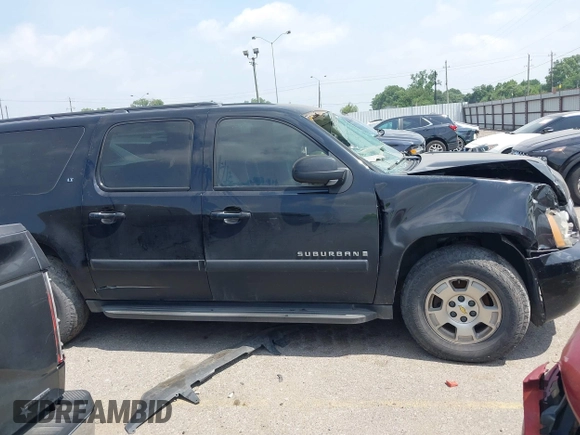 2008 Chevrolet Suburban 3LT z VIN 3GNFC16018G108883, wystawiony jako IAAI lot #42271973 z przebiegiem Nie podano mil oraz . Historia ofert i sprzedaży dostępna na DreamBid. Obrazek 13.