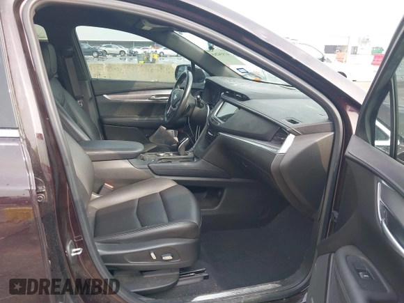 2021 Cadillac XT5 FWD Luxury with VIN 1GYKNAR44MZ184070, listed as a IAAI auction lot 41934265 with 60,596 mi miles and . Bid and sale history available at DreamBid. Image 5.