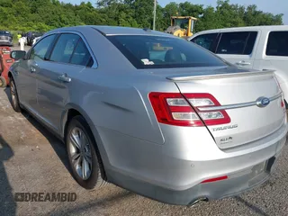 2015 Ford Taurus SEL with VIN 1FAHP2E85FG174242, listed as a IAAI auction lot 42407291 with 108,852 mi miles and . Bid and sale history available at DreamBid. Image 3.