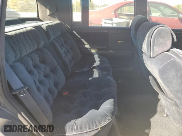 1990 Chrysler New Yorker z VIN 1C3XY66R4LD784183, wystawiony jako Copart lot #75364784 z przebiegiem 114 456 mil mil oraz Tytuł czysty. Historia ofert i sprzedaży dostępna na DreamBid. Obrazek 10.