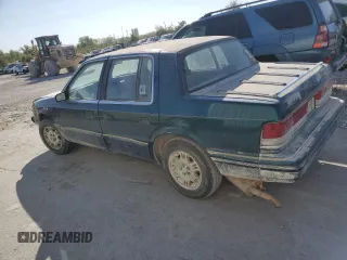 1995 Plymouth Acclaim z VIN 3P3AA4639ST552970, wystawiony jako Copart lot #76737854 z przebiegiem 113 119 mil mil oraz Szkody całkowita. Historia ofert i sprzedaży dostępna na DreamBid. Obrazek 2.