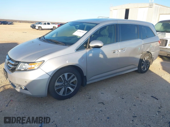 2014 Honda Odyssey Touring with VIN 5FNRL5H97EB094353, listed as a IAAI auction lot 41701712 with 141,228 mi miles and . Bid and sale history available at DreamBid. Image 21.