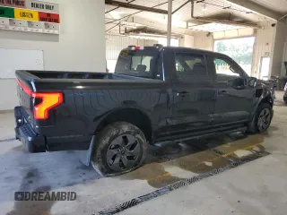2023 Ford F-150 Lightning Pro z VIN 1FTVW1EV0PWG06971, wystawiony jako Copart lot #61850635 z przebiegiem 32 388 mil mil oraz Szkoda całkowita • Salvage title. Historia ofert i sprzedaży dostępna na DreamBid. Obrazek 3.
