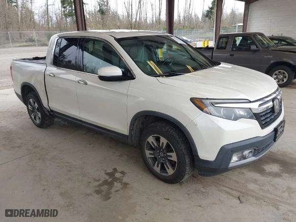 2017 Honda Ridgeline RTL-E with VIN 5FPYK3F7XHB030551, listed as a IAAI auction lot 41903844 with 153,594 mi miles. Bid and sale history available at carsss.com. Image 1.