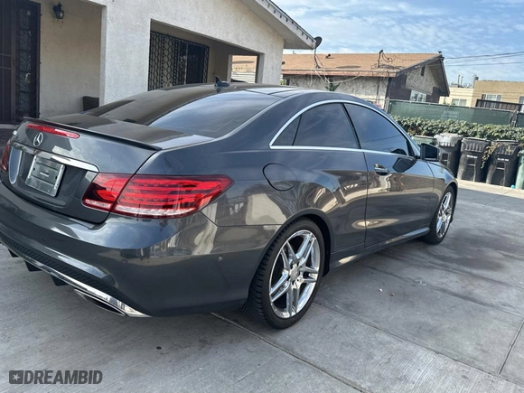 2014 Mercedes-Benz E-Class E 550 with VIN WDDKJ7DB2EF233463, listed as a Copart auction lot 83615894 with 112,537 mi miles and Clean Title. Bid and sale history available at carsss.com. Image 4.